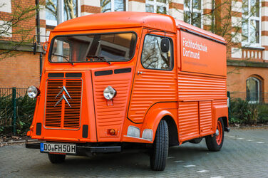 The Citroën HY stands in front of Building F at Fachhochschule Dortmund's Sonnenstraße campus during the Open Day.