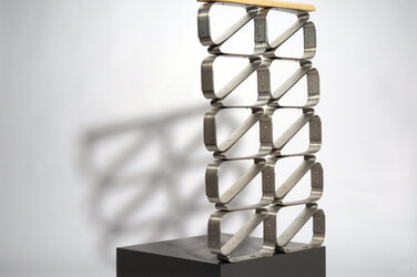 Finished prototype of an aluminum railing construction against a white background.