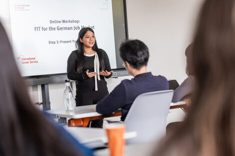 International student gives a presentation to other participants in the workshop "FIT for the German Job Market" organized by the International Career Service.