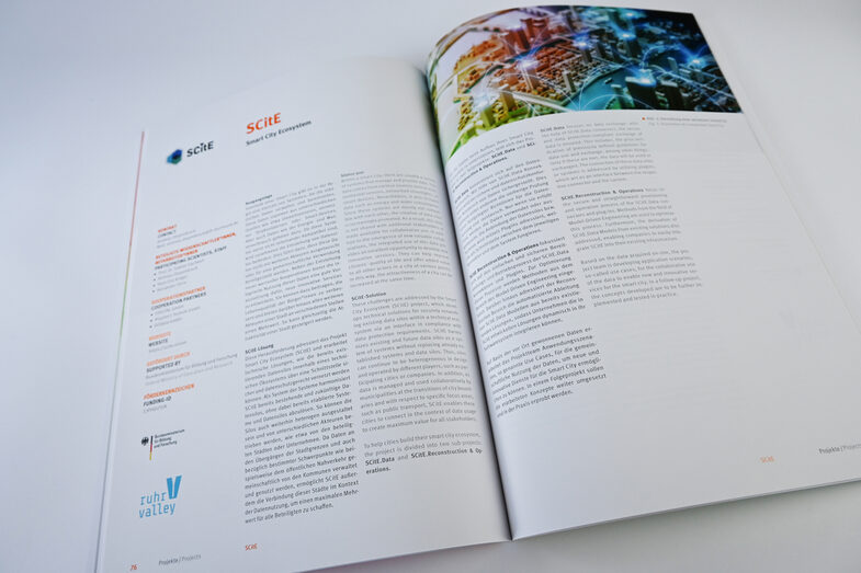 Double page of the 2022 annual report with title, text (German & English) and images.