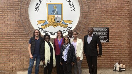 Group picture in front of the Midlands State University in Zimbabwe