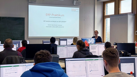 Pupils work on the computers in the computer pool during the ERP internship